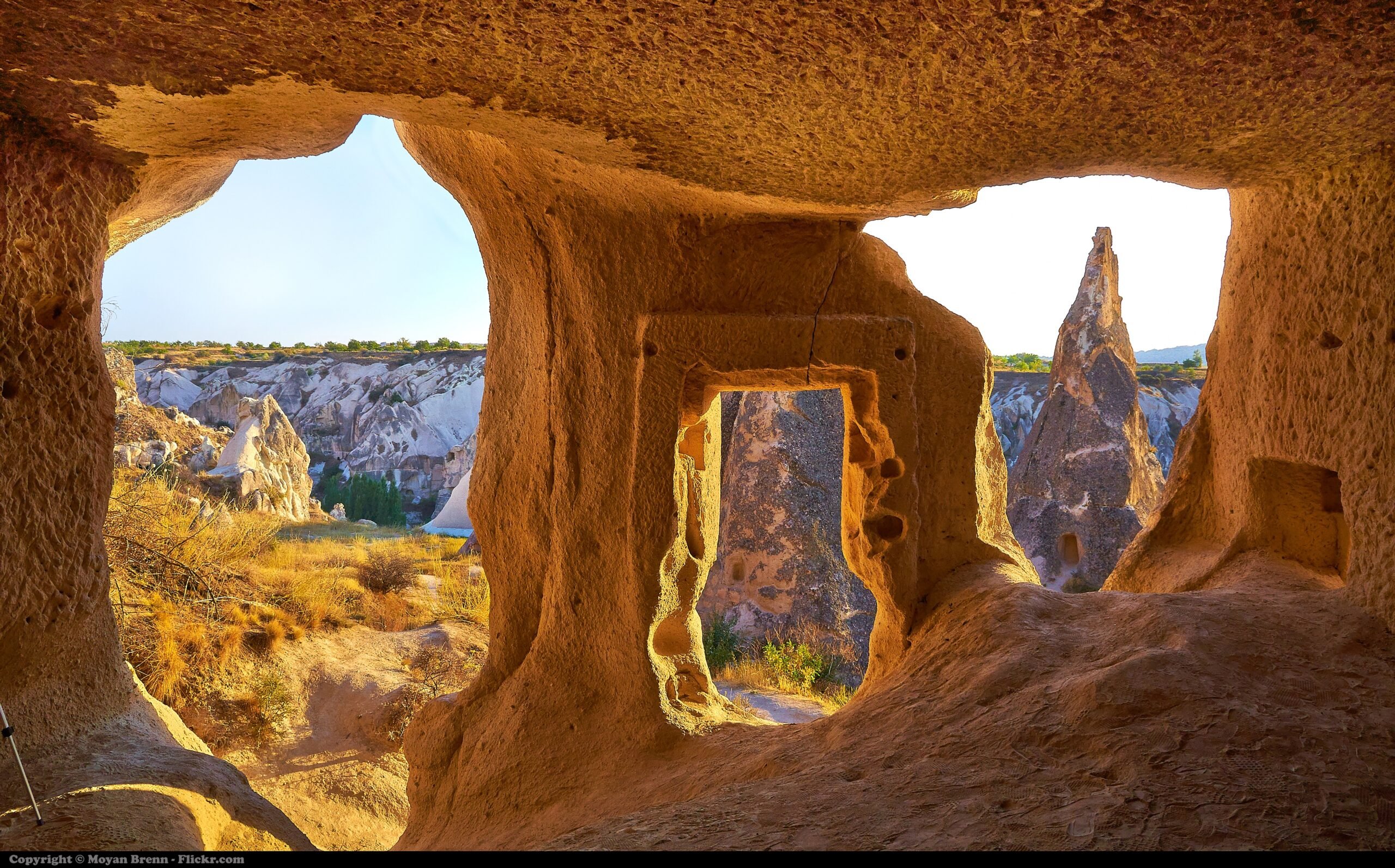 A cave with a window
AI-generated content may be incorrect.