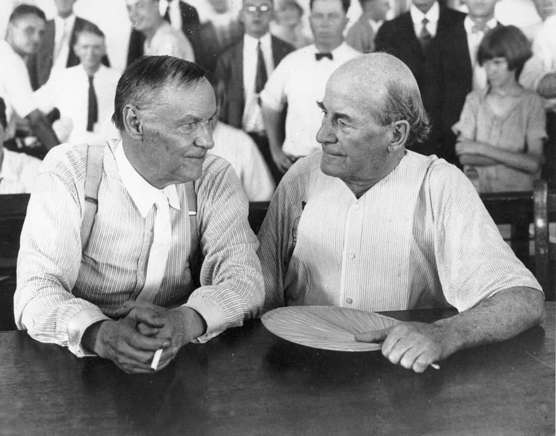 Defense attorney Clarence Darrow, left, and prosecutor William Jennings Bryan speak with each other during the trial.
